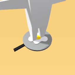 The Frying pan with an egg.