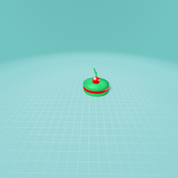 Tasty Macaron with Straberry jelly in it and a cherry on top