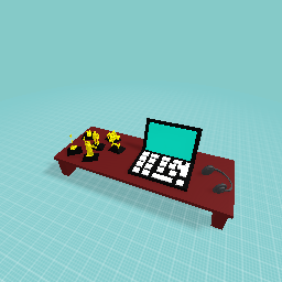 My laptop, Table, and Trophies By Ahmed Amro
