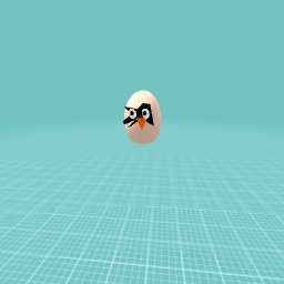 A chicken hatching out of his egg