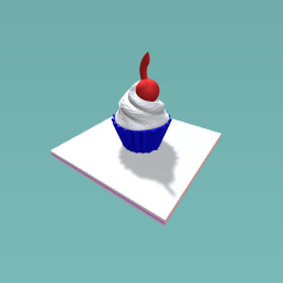 cup cake with a charrie on top