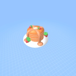 Strawberry pancakes with butter and syrup