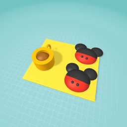 Mickey mouse cookies and  hot coco