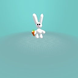 The fluffy bunny who is eating a carrort