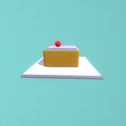 Caramel slice with pink and aqua icing with a cherry on top