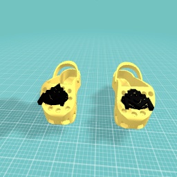 Crocs with a makers empire pin