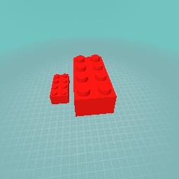 A duplo and lego brick